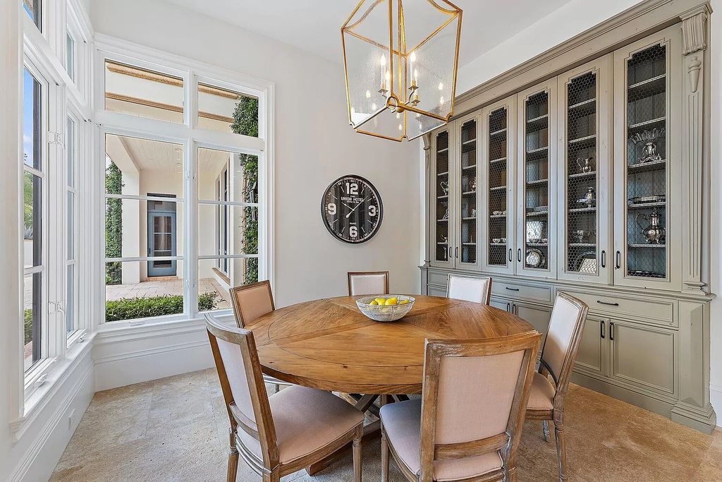 Boasting the finest views in Old Palm, this 6-bedroom, 8.5-bathroom estate offers complete privacy and an entertainer's dream kitchen. With all new French Oak floors, light fixtures, bathrooms, and more, this home is truly the best of the best!