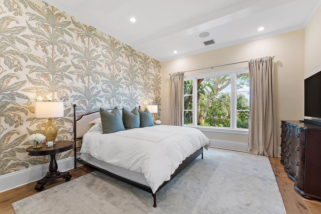 Boasting the finest views in Old Palm, this 6-bedroom, 8.5-bathroom estate offers complete privacy and an entertainer's dream kitchen. With all new French Oak floors, light fixtures, bathrooms, and more, this home is truly the best of the best!