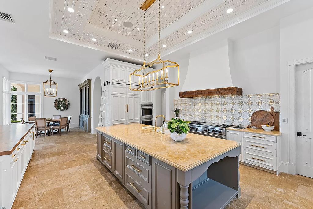 Boasting the finest views in Old Palm, this 6-bedroom, 8.5-bathroom estate offers complete privacy and an entertainer's dream kitchen. With all new French Oak floors, light fixtures, bathrooms, and more, this home is truly the best of the best!