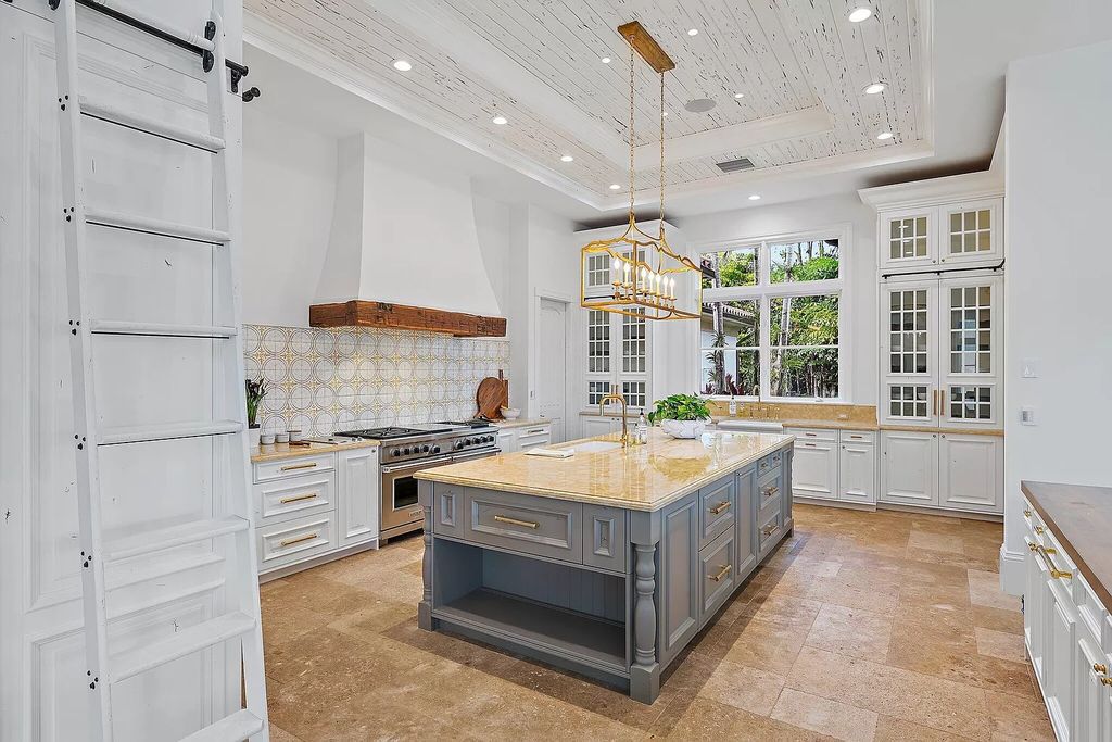 Boasting the finest views in Old Palm, this 6-bedroom, 8.5-bathroom estate offers complete privacy and an entertainer's dream kitchen. With all new French Oak floors, light fixtures, bathrooms, and more, this home is truly the best of the best!