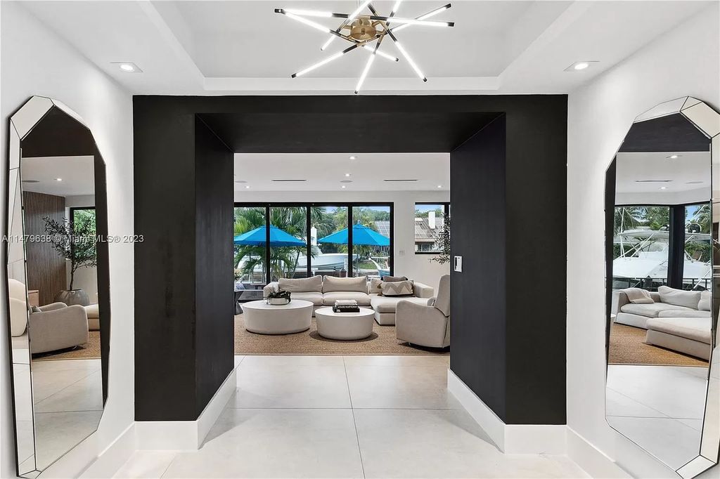 Experience the epitome of luxury living in this newly completed 8-bedroom waterfront masterpiece in Gables by the Sea. With fluid modern design, exquisite craftsmanship, and lavish amenities, this stunning residence offers an unparalleled lifestyle of elegance and sophistication.