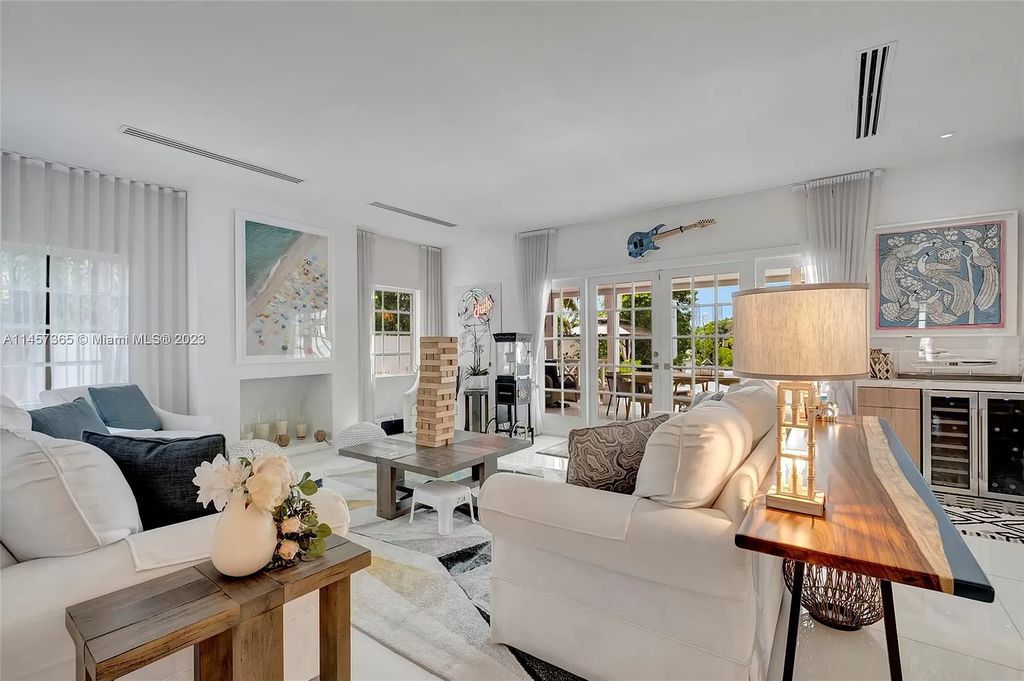 This completely renovated Venetian Island waterfront home offers immaculate views of the Port of Miami, Brickell, Downtown, and Edgewater. With 4 bedrooms and 4 full bathrooms, the master suite is the perfect place to relax and unwind. The backyard has been transformed with a full summer kitchen, outdoor shower, and dock, making this home perfect for entertaining or enjoying the Miami Beach lifestyle.