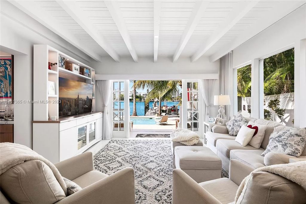 This completely renovated Venetian Island waterfront home offers immaculate views of the Port of Miami, Brickell, Downtown, and Edgewater. With 4 bedrooms and 4 full bathrooms, the master suite is the perfect place to relax and unwind. The backyard has been transformed with a full summer kitchen, outdoor shower, and dock, making this home perfect for entertaining or enjoying the Miami Beach lifestyle.