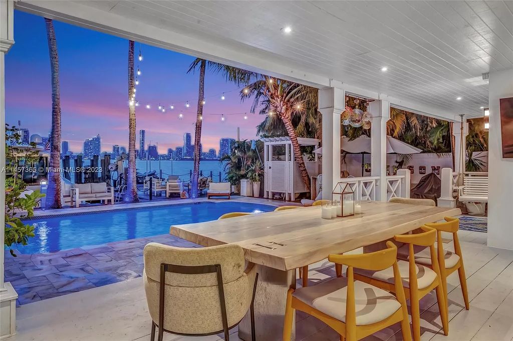 This completely renovated Venetian Island waterfront home offers immaculate views of the Port of Miami, Brickell, Downtown, and Edgewater. With 4 bedrooms and 4 full bathrooms, the master suite is the perfect place to relax and unwind. The backyard has been transformed with a full summer kitchen, outdoor shower, and dock, making this home perfect for entertaining or enjoying the Miami Beach lifestyle.