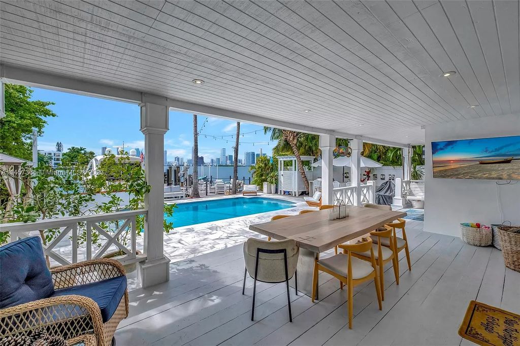 This completely renovated Venetian Island waterfront home offers immaculate views of the Port of Miami, Brickell, Downtown, and Edgewater. With 4 bedrooms and 4 full bathrooms, the master suite is the perfect place to relax and unwind. The backyard has been transformed with a full summer kitchen, outdoor shower, and dock, making this home perfect for entertaining or enjoying the Miami Beach lifestyle.