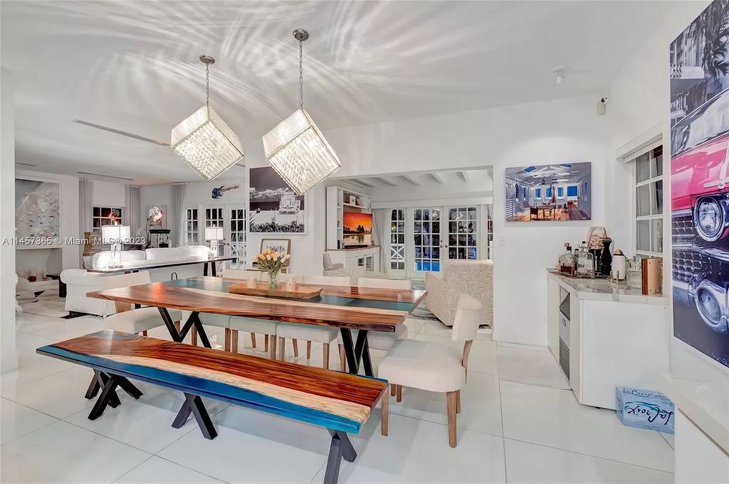 This completely renovated Venetian Island waterfront home offers immaculate views of the Port of Miami, Brickell, Downtown, and Edgewater. With 4 bedrooms and 4 full bathrooms, the master suite is the perfect place to relax and unwind. The backyard has been transformed with a full summer kitchen, outdoor shower, and dock, making this home perfect for entertaining or enjoying the Miami Beach lifestyle.