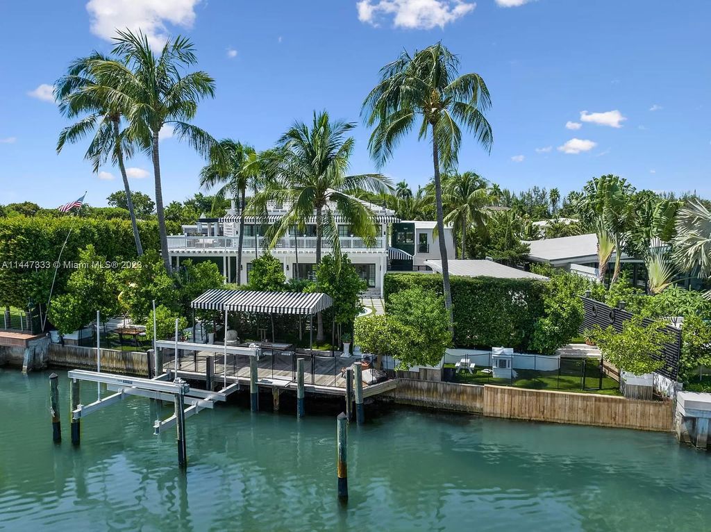 Discover this exquisite waterfront haven on Flamingo Drive, where timeless elegance meets modern luxury. Recently renovated to perfection, this spacious residence boasts an array of sophisticated features, including an oversized primary retreat, a heated saltwater pool, and a private dock. Experience resort-style living just minutes from the ocean, Sunset Harbour, and all that Miami Beach has to offer.