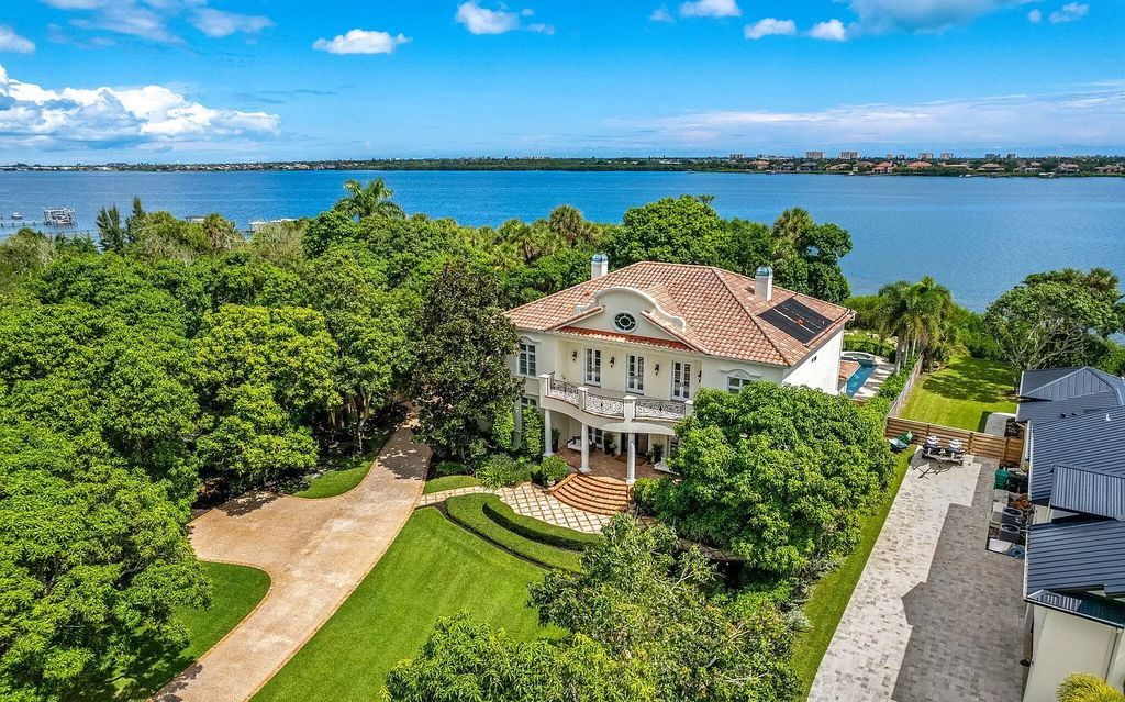 Escape to your own private paradise in this 5-bedroom waterfront retreat on S Tropical Trail. Nestled on 1.04 acres, this stunning home offers modern amenities, breathtaking views, and a tranquil oasis to call your own.