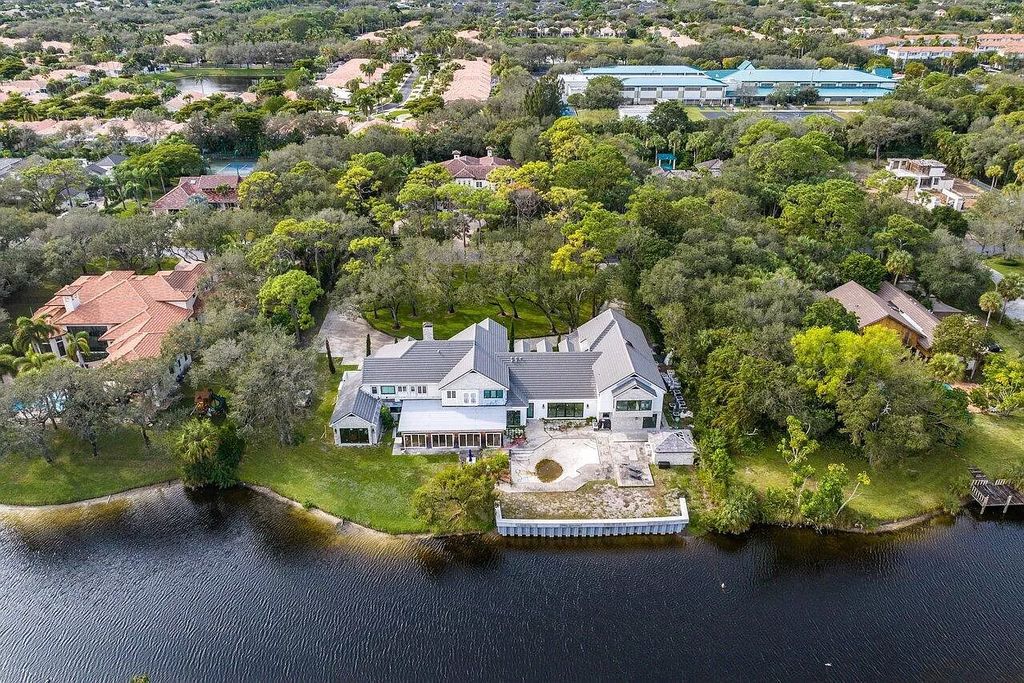 Unwind in unparalleled luxury at this breathtaking Delray Beach estate. Completely renovated with 8 bedrooms, 7.2 baths, and a guest house, this 12,000 sq ft paradise boasts resort-style pools, a spa, and Old World charm with modern amenities. Gourmet kitchen, home theater, billiards room, and air-conditioned 6-car garage. Minutes from beach, downtown, and top schools. Must see!