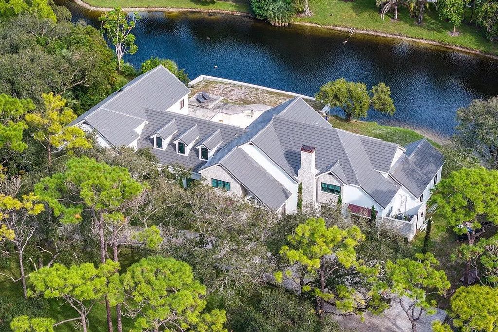 Unwind in unparalleled luxury at this breathtaking Delray Beach estate. Completely renovated with 8 bedrooms, 7.2 baths, and a guest house, this 12,000 sq ft paradise boasts resort-style pools, a spa, and Old World charm with modern amenities. Gourmet kitchen, home theater, billiards room, and air-conditioned 6-car garage. Minutes from beach, downtown, and top schools. Must see!