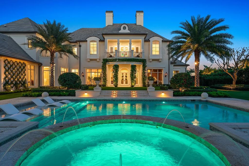 Palm Beach Gardens awaits with this European-style mansion. 5 bedrooms, spa, wine room, & resort-like amenities at your doorstep. Live the dream at Old Palm Golf Club. Membership included.