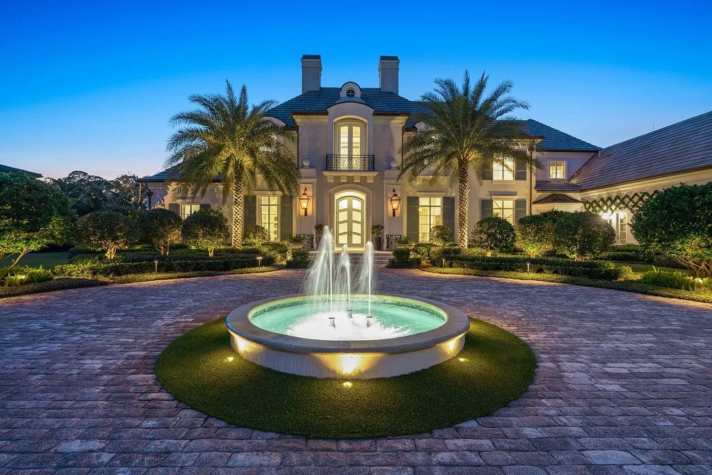 Palm Beach Gardens awaits with this European-style mansion. 5 bedrooms, spa, wine room, & resort-like amenities at your doorstep. Live the dream at Old Palm Golf Club. Membership included.