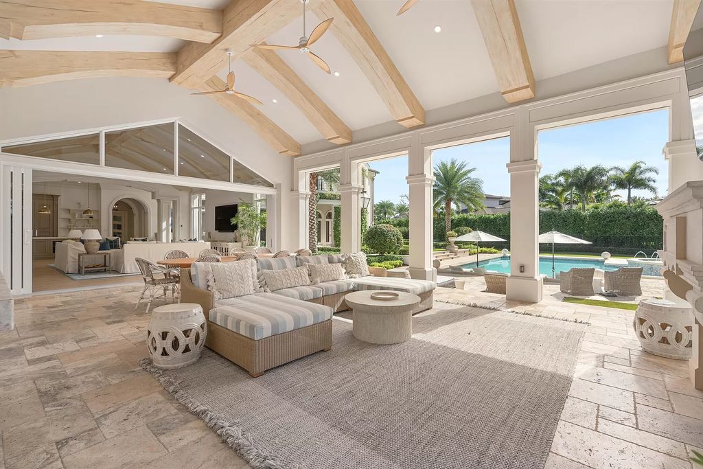 Palm Beach Gardens awaits with this European-style mansion. 5 bedrooms, spa, wine room, & resort-like amenities at your doorstep. Live the dream at Old Palm Golf Club. Membership included.