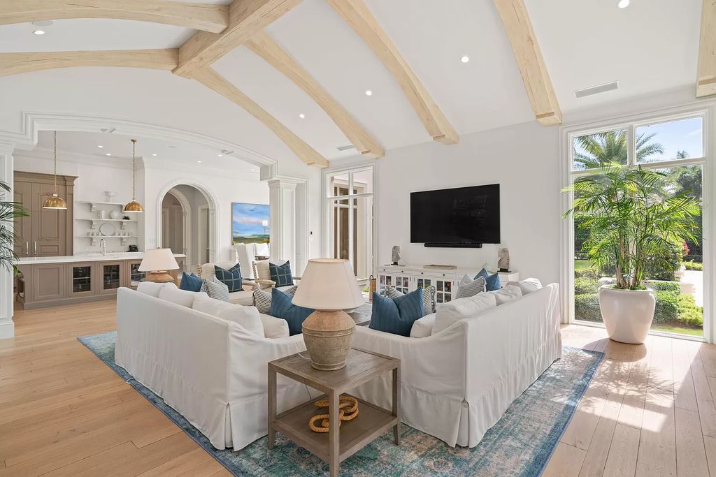 Palm Beach Gardens awaits with this European-style mansion. 5 bedrooms, spa, wine room, & resort-like amenities at your doorstep. Live the dream at Old Palm Golf Club. Membership included.