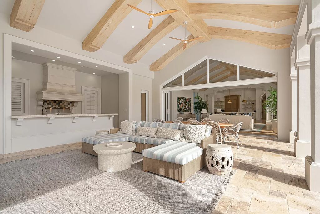 Palm Beach Gardens awaits with this European-style mansion. 5 bedrooms, spa, wine room, & resort-like amenities at your doorstep. Live the dream at Old Palm Golf Club. Membership included.