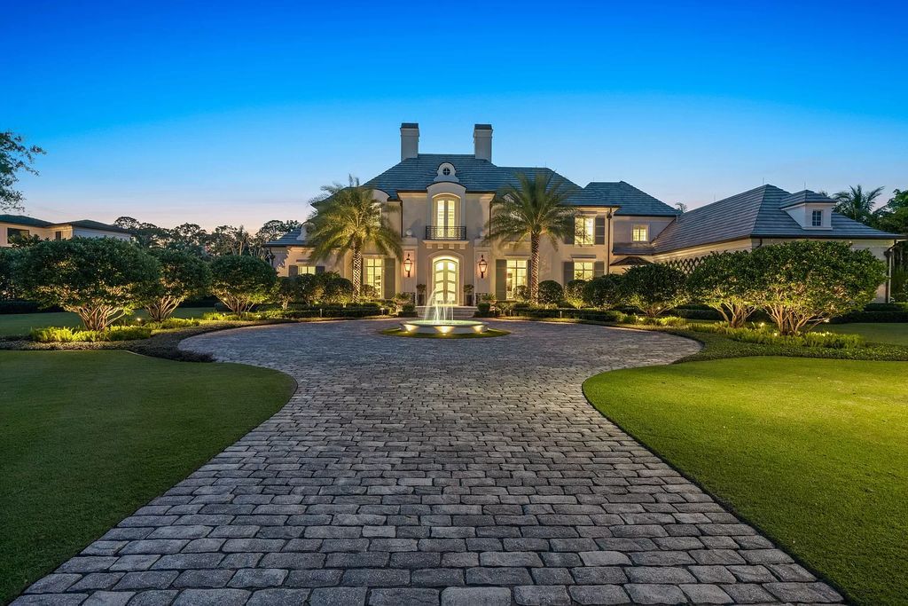 Palm Beach Gardens awaits with this European-style mansion. 5 bedrooms, spa, wine room, & resort-like amenities at your doorstep. Live the dream at Old Palm Golf Club. Membership included.