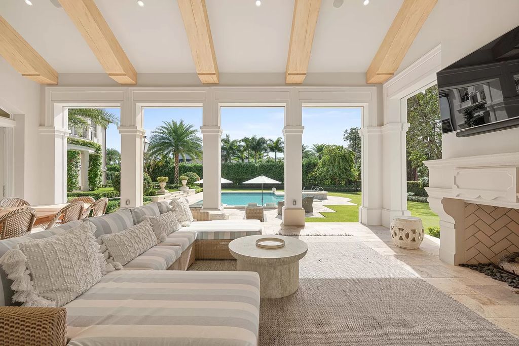 Palm Beach Gardens awaits with this European-style mansion. 5 bedrooms, spa, wine room, & resort-like amenities at your doorstep. Live the dream at Old Palm Golf Club. Membership included.