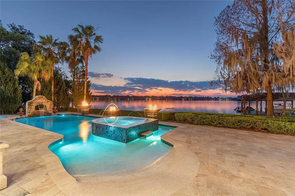 Own a piece of paradise! This custom-built lakefront estate boasts panoramic views, luxurious interiors, and unparalleled privacy on the exclusive Isle of Sicily. Enjoy chef's kitchen, spa-like master suite, resort-style pool and more!