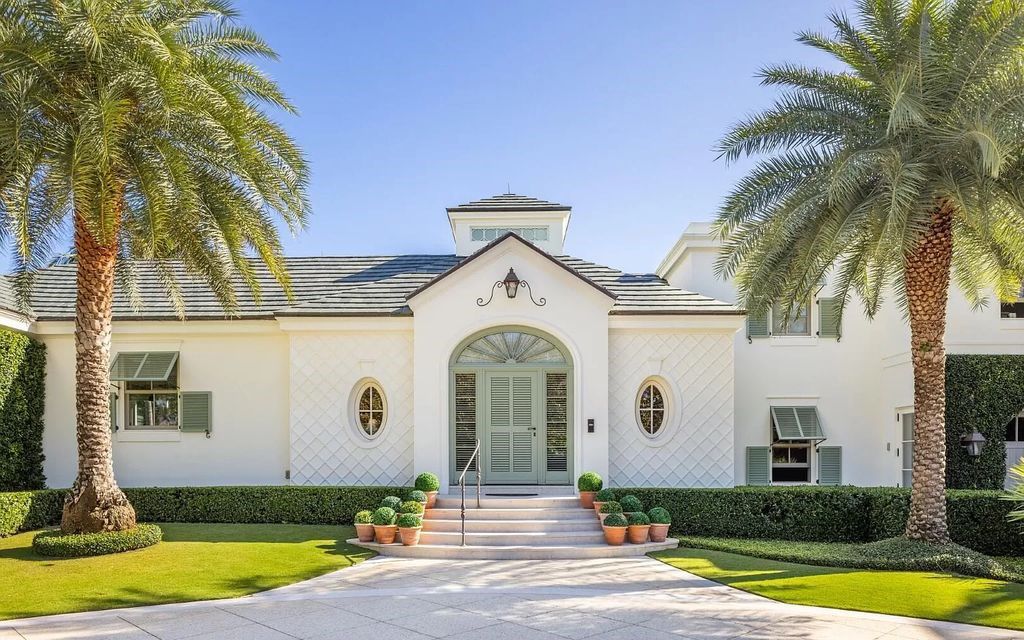 Immerse yourself in Palm Beach luxury at this stunning 1.3-acre estate! Featuring a private tennis court, 2 guest houses, & resort-style amenities like a pool, loggia, & pergola, this 7-bed, 8.5-bath masterpiece offers the ultimate in indoor & outdoor living. Grand living spaces, gourmet kitchen, & lavish master suite await. Don't miss this oasis!