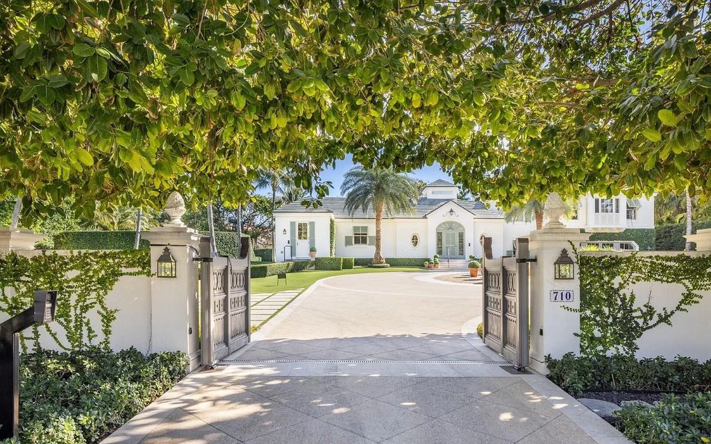 Immerse yourself in Palm Beach luxury at this stunning 1.3-acre estate! Featuring a private tennis court, 2 guest houses, & resort-style amenities like a pool, loggia, & pergola, this 7-bed, 8.5-bath masterpiece offers the ultimate in indoor & outdoor living. Grand living spaces, gourmet kitchen, & lavish master suite await. Don't miss this oasis!