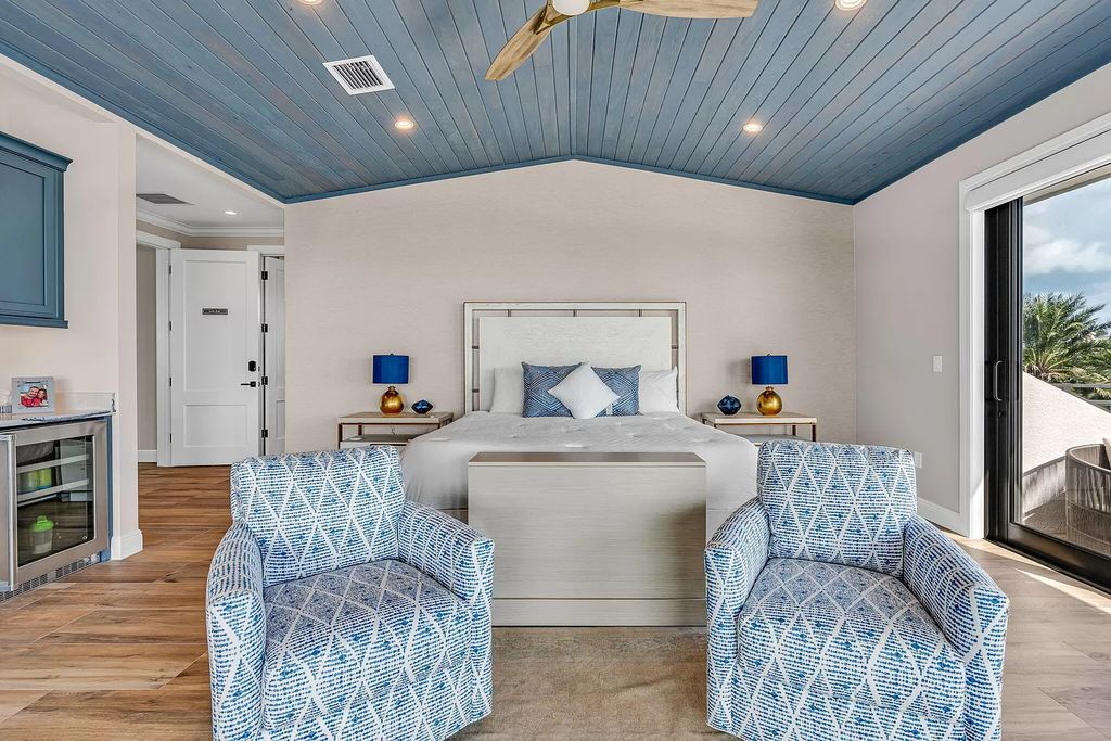 Wake up to waves lapping your private shore & breathtaking ocean views in this iconic Key Colony Beach retreat. 9 serene bedrooms, private pool, & endless entertainment space await in this coastal paradise. Luxury living redefined.