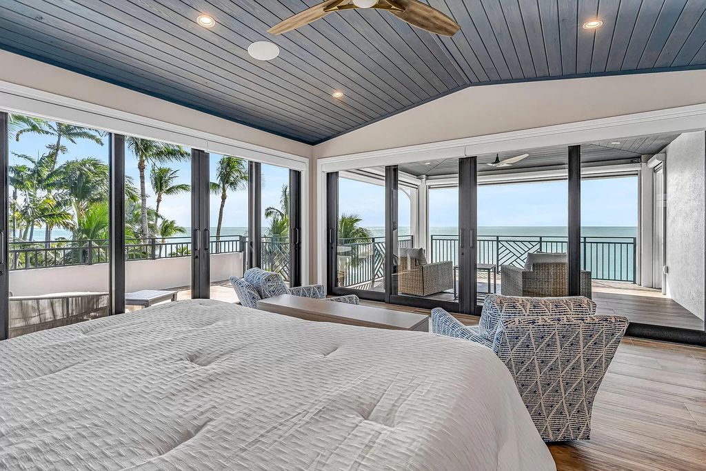 Wake up to waves lapping your private shore & breathtaking ocean views in this iconic Key Colony Beach retreat. 9 serene bedrooms, private pool, & endless entertainment space await in this coastal paradise. Luxury living redefined.