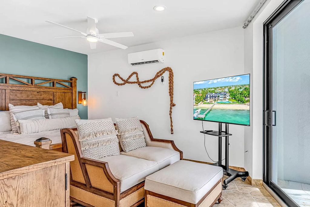 Wake up to waves lapping your private shore & breathtaking ocean views in this iconic Key Colony Beach retreat. 9 serene bedrooms, private pool, & endless entertainment space await in this coastal paradise. Luxury living redefined.