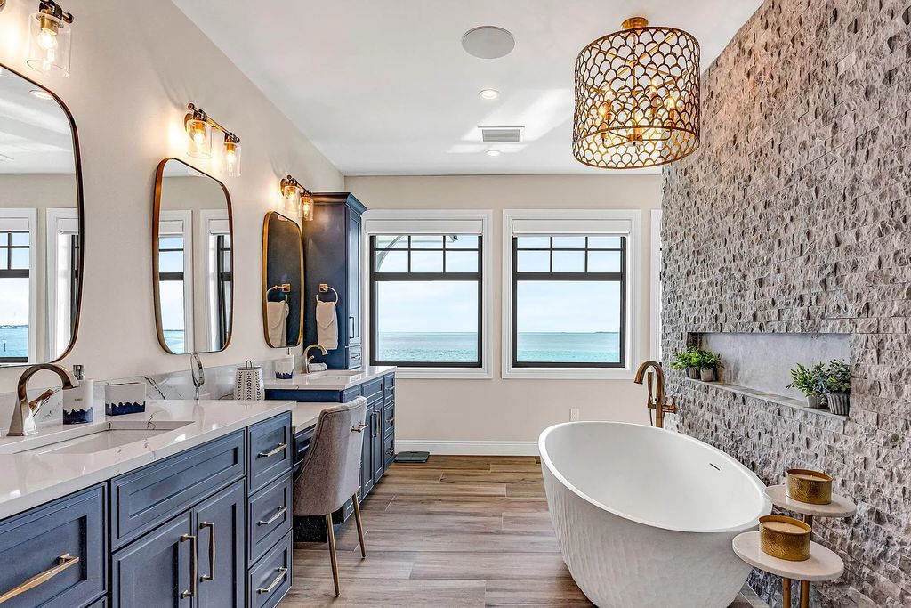 Wake up to waves lapping your private shore & breathtaking ocean views in this iconic Key Colony Beach retreat. 9 serene bedrooms, private pool, & endless entertainment space await in this coastal paradise. Luxury living redefined.