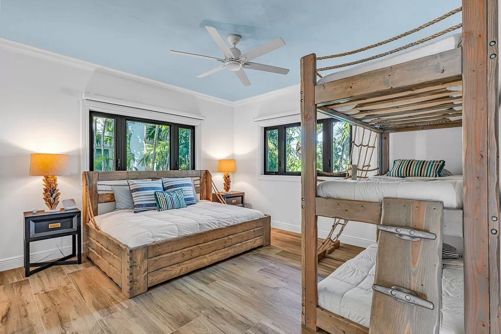 Wake up to waves lapping your private shore & breathtaking ocean views in this iconic Key Colony Beach retreat. 9 serene bedrooms, private pool, & endless entertainment space await in this coastal paradise. Luxury living redefined.