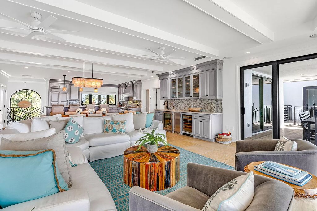 Wake up to waves lapping your private shore & breathtaking ocean views in this iconic Key Colony Beach retreat. 9 serene bedrooms, private pool, & endless entertainment space await in this coastal paradise. Luxury living redefined.