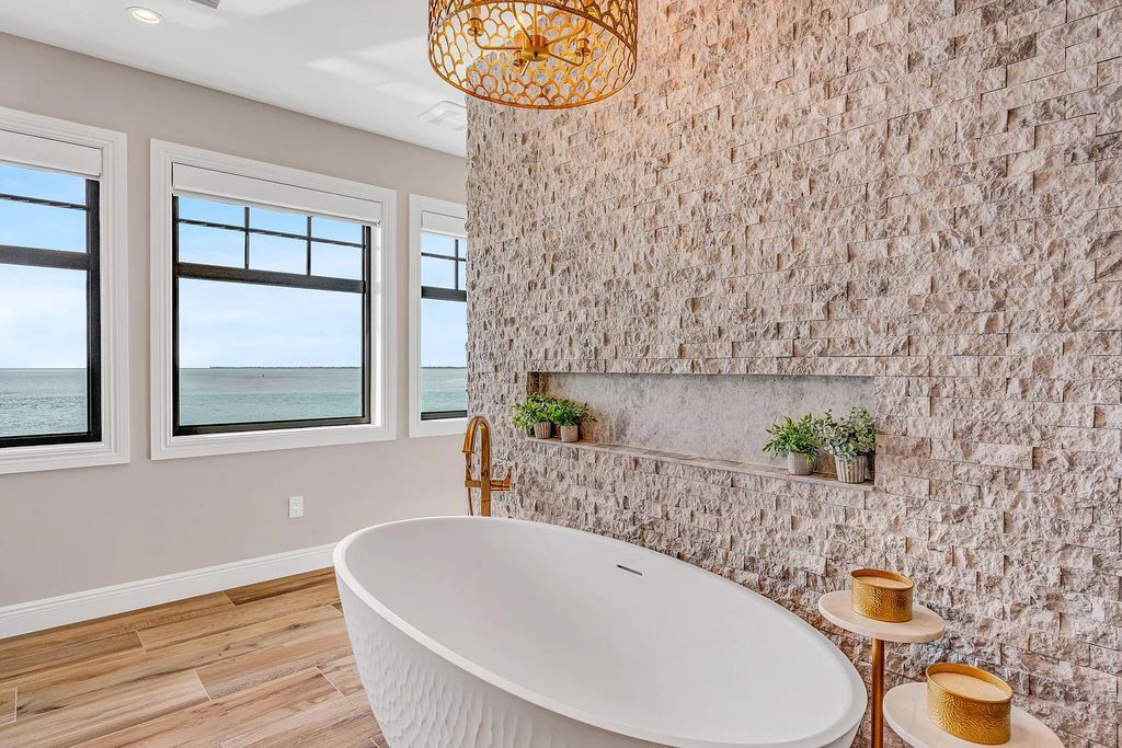 Wake up to waves lapping your private shore & breathtaking ocean views in this iconic Key Colony Beach retreat. 9 serene bedrooms, private pool, & endless entertainment space await in this coastal paradise. Luxury living redefined.