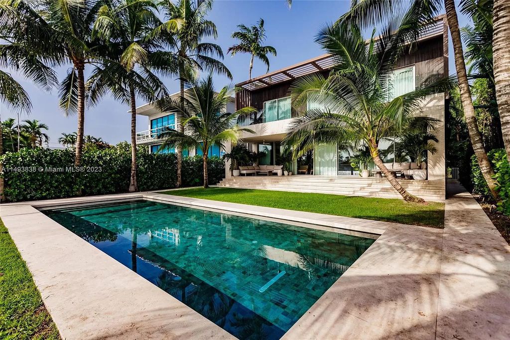 Immerse yourself in unparalleled luxury at this brand new, 5,393 sq ft waterfront masterpiece on Miami Beach's Rivo Alto Island. Featuring 6 bedrooms, 5.5 baths, breathtaking western views, and a smart-home system for effortless living, this fully furnished sanctuary is the epitome of coastal elegance.