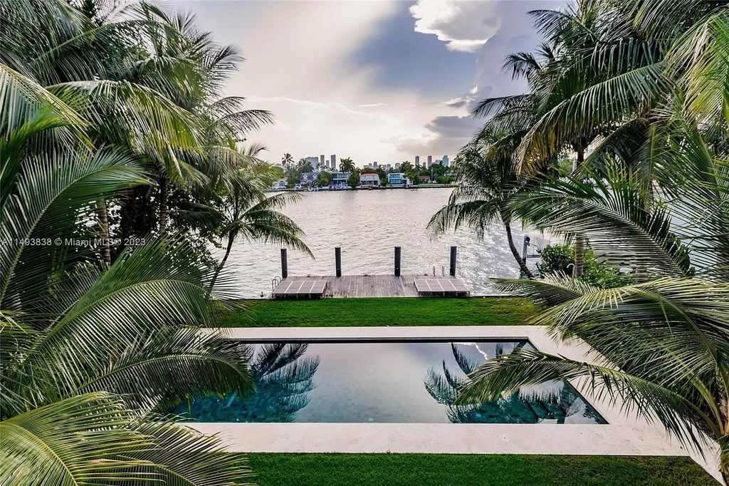 Immerse yourself in unparalleled luxury at this brand new, 5,393 sq ft waterfront masterpiece on Miami Beach's Rivo Alto Island. Featuring 6 bedrooms, 5.5 baths, breathtaking western views, and a smart-home system for effortless living, this fully furnished sanctuary is the epitome of coastal elegance.