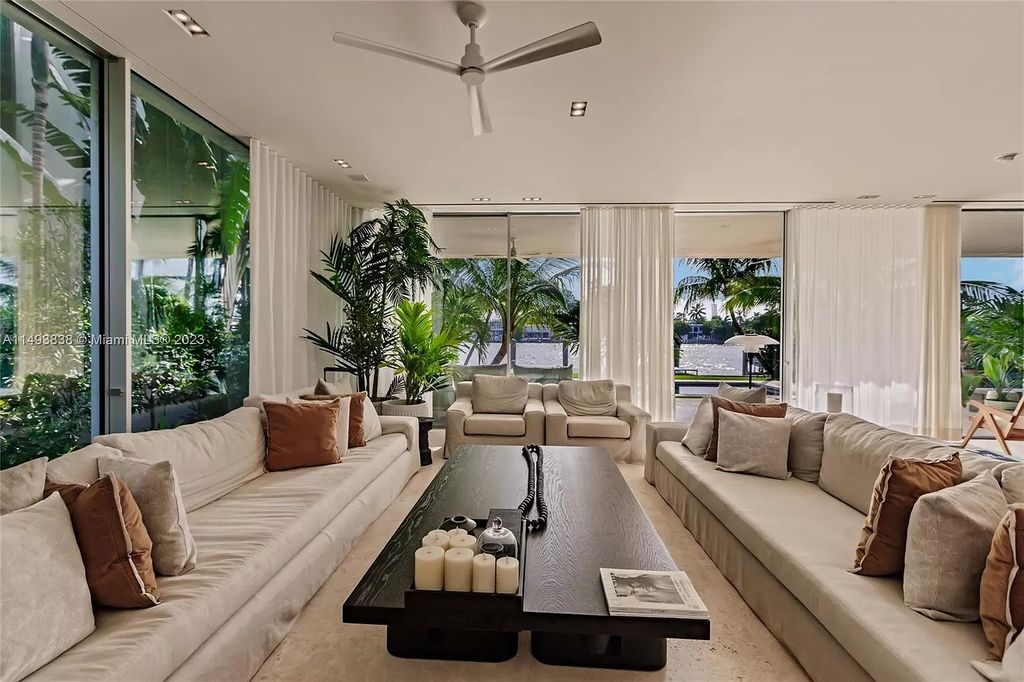 Immerse yourself in unparalleled luxury at this brand new, 5,393 sq ft waterfront masterpiece on Miami Beach's Rivo Alto Island. Featuring 6 bedrooms, 5.5 baths, breathtaking western views, and a smart-home system for effortless living, this fully furnished sanctuary is the epitome of coastal elegance.