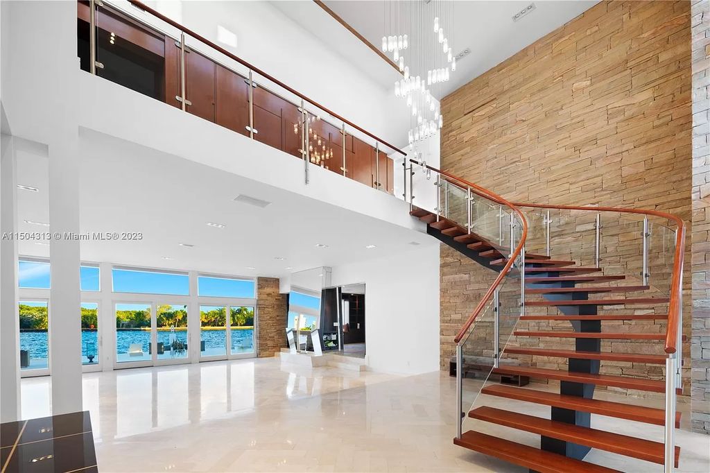 Step into a mid-century dream! This Fort Lauderdale estate boasts soaring ceilings, infinity pool & Intracoastal vistas. Master suite sanctuary, rooftop fireplace, potential expansion - experience Florida luxury redefined. 2110 Intracoastal Dr awaits.