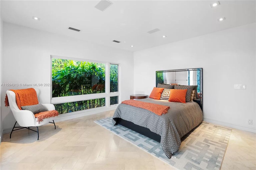 Step into a mid-century dream! This Fort Lauderdale estate boasts soaring ceilings, infinity pool & Intracoastal vistas. Master suite sanctuary, rooftop fireplace, potential expansion - experience Florida luxury redefined. 2110 Intracoastal Dr awaits.