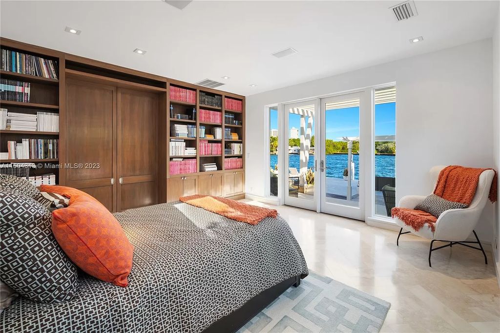 Step into a mid-century dream! This Fort Lauderdale estate boasts soaring ceilings, infinity pool & Intracoastal vistas. Master suite sanctuary, rooftop fireplace, potential expansion - experience Florida luxury redefined. 2110 Intracoastal Dr awaits.