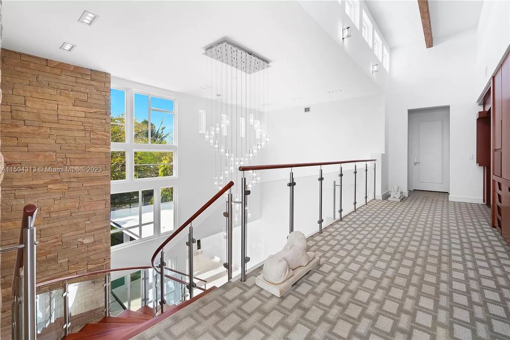 Step into a mid-century dream! This Fort Lauderdale estate boasts soaring ceilings, infinity pool & Intracoastal vistas. Master suite sanctuary, rooftop fireplace, potential expansion - experience Florida luxury redefined. 2110 Intracoastal Dr awaits.