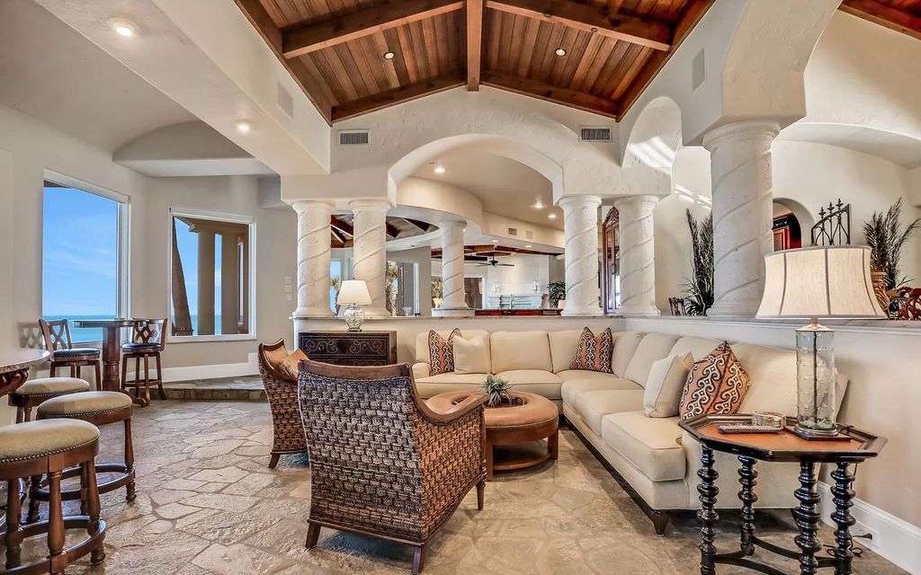 Experience unparalleled luxury at 1263 Ponte Vedra Blvd. This 12,751 sq ft custom estate boasts 200' ocean frontage, panoramic sunrise views, 6 ensuite bedrooms, a private beach, lagoon pool, gym, wine cellar, & more. Minutes from dining, shopping, & exclusive clubs.