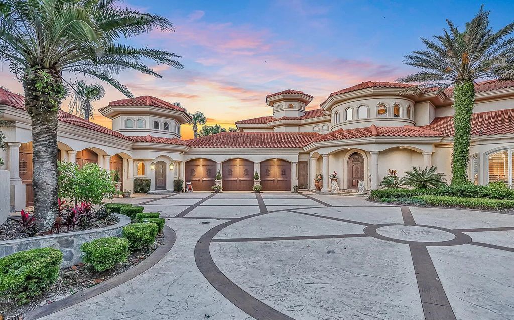 Experience unparalleled luxury at 1263 Ponte Vedra Blvd. This 12,751 sq ft custom estate boasts 200' ocean frontage, panoramic sunrise views, 6 ensuite bedrooms, a private beach, lagoon pool, gym, wine cellar, & more. Minutes from dining, shopping, & exclusive clubs.