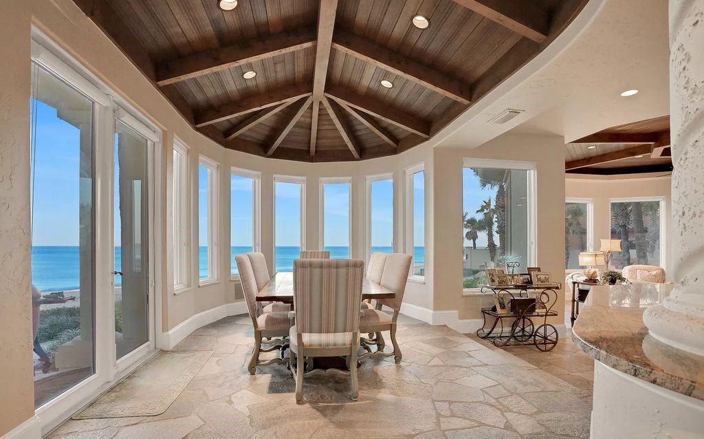 Experience unparalleled luxury at 1263 Ponte Vedra Blvd. This 12,751 sq ft custom estate boasts 200' ocean frontage, panoramic sunrise views, 6 ensuite bedrooms, a private beach, lagoon pool, gym, wine cellar, & more. Minutes from dining, shopping, & exclusive clubs.