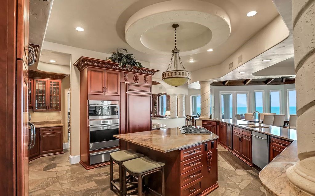 Experience unparalleled luxury at 1263 Ponte Vedra Blvd. This 12,751 sq ft custom estate boasts 200' ocean frontage, panoramic sunrise views, 6 ensuite bedrooms, a private beach, lagoon pool, gym, wine cellar, & more. Minutes from dining, shopping, & exclusive clubs.