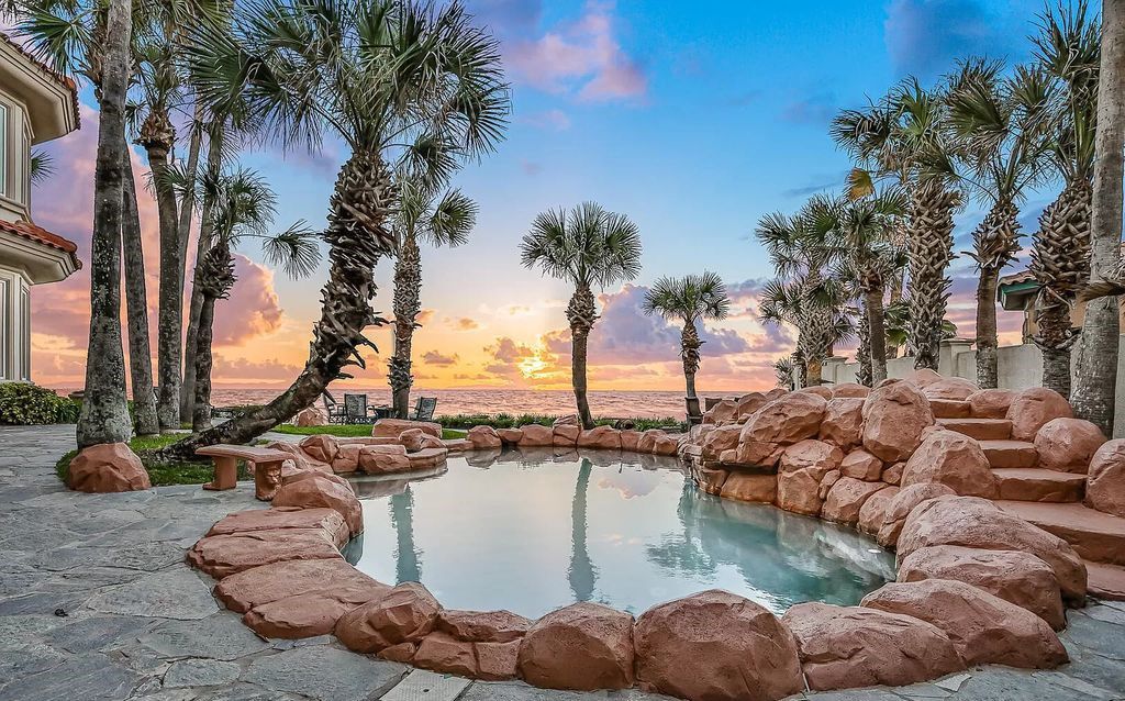 Experience unparalleled luxury at 1263 Ponte Vedra Blvd. This 12,751 sq ft custom estate boasts 200' ocean frontage, panoramic sunrise views, 6 ensuite bedrooms, a private beach, lagoon pool, gym, wine cellar, & more. Minutes from dining, shopping, & exclusive clubs.