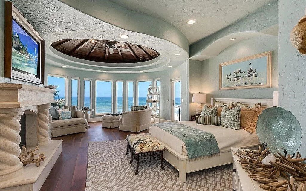 Experience unparalleled luxury at 1263 Ponte Vedra Blvd. This 12,751 sq ft custom estate boasts 200' ocean frontage, panoramic sunrise views, 6 ensuite bedrooms, a private beach, lagoon pool, gym, wine cellar, & more. Minutes from dining, shopping, & exclusive clubs.