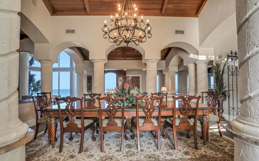 Experience unparalleled luxury at 1263 Ponte Vedra Blvd. This 12,751 sq ft custom estate boasts 200' ocean frontage, panoramic sunrise views, 6 ensuite bedrooms, a private beach, lagoon pool, gym, wine cellar, & more. Minutes from dining, shopping, & exclusive clubs.