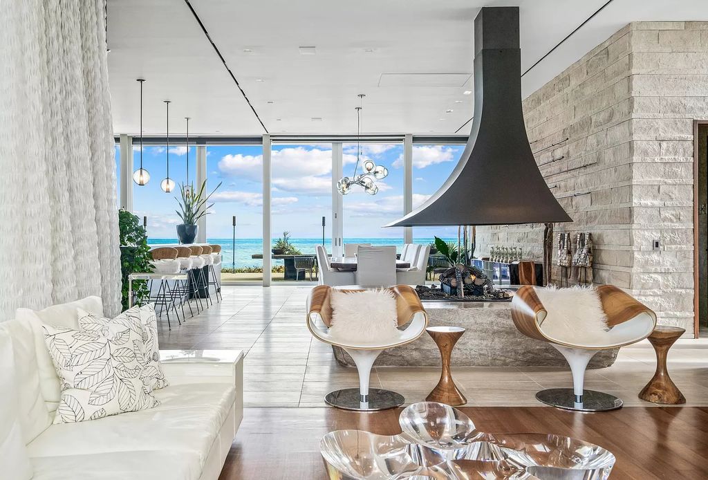 Unwind in paradise at this 8-bed, 12-bath oceanfront estate in Vero Beach. Private compound boasts 2 pools, guest house, Savant smart home, & ultimate storm protection. Your beachfront sanctuary awaits!