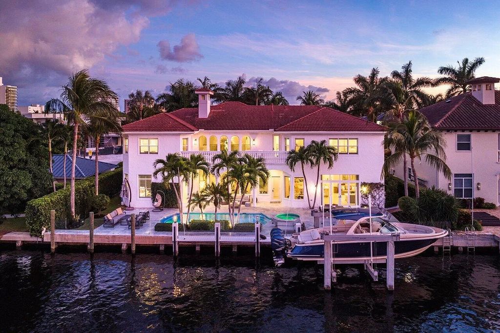 Experience the epitome of luxury living in this meticulously renovated 5-bedroom, 5.1-bathroom Delray Beach estate, boasting over 7,700 square feet of exquisite living space. Nestled within the prestigious waterfront community of Tropic Isle, this turnkey home is positioned on 100' of prime waterfront, offering unparalleled Intracoastal views and an unparalleled living experience.