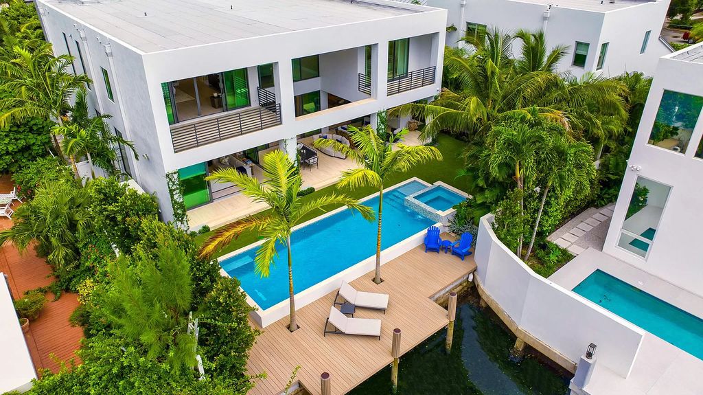 Dive into coastal living at this brand-new 5-bedroom masterpiece. Waterfront paradise with pool, dock and chic interiors steps from award-winning beaches and vibrant Delray Beach. Indoor/outdoor living redefined.