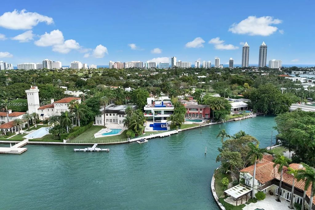 Discover elegance in this $42.5 million contemporary masterpiece by Jennifer Post on North Bay Road, Miami Beach. Atrium courtyard, infinity edge pool, rooftop pool, and a private dock with 105 feet of water frontage offer luxury living with breathtaking views.