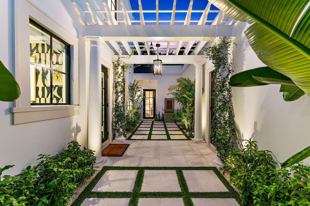 Step into timeless elegance at Villa Monceaux, a 2023 designer masterpiece nestled in the heart of West Palm Beach's coveted El Cid/Prospect Park. This 4-bedroom, 3-bathroom stunner boasts soaring cathedral ceilings, an open-concept layout, and top-of-the-line finishes throughout.